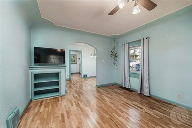 Dining area with refinished oak floors throughout