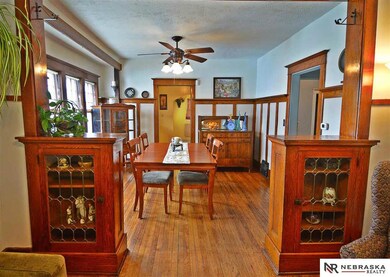Original Woodwork with Oak floors and built in cabinets. Freshly painted in Agreeable Grey. Gorgeous Hunter Douglas Ceiling Fan.