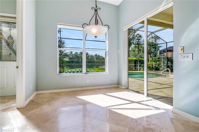 Breakfast room overlooking the lanai and pool area