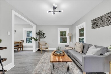 Living room featuring a wealth of natural light an