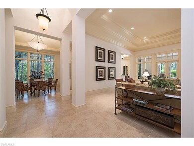 Grand entry with groin vault ceiling and private d