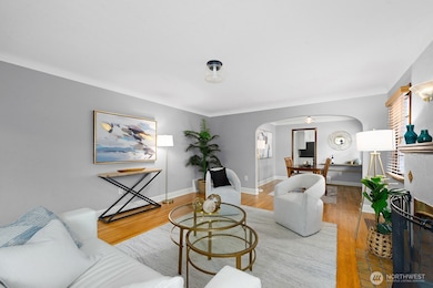 Arched doorway defines the entrance to formal dining room.