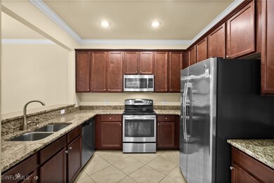 Kitchen featuring appliances with stainless steel