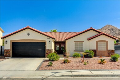 Mediterranean / spanish-style home featuring an at