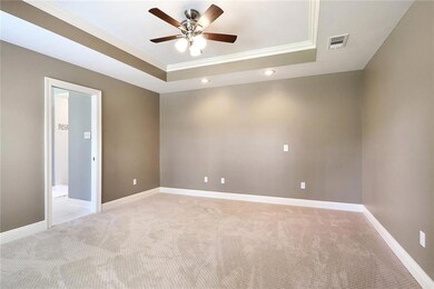 Freshly painted and new carpet in Master bedroom,
