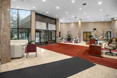 Elegant lobby entry featuring 24-hour security and full-time doorman service.