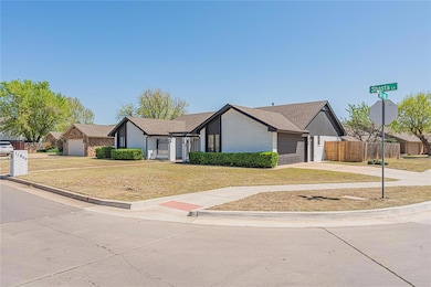 Ranch-style house featuring a front yard, fence, b