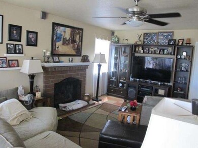 Family Room with cozy fireplace & nice mantel.