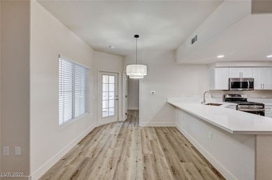 Kitchen featuring appliances with stainless steel
