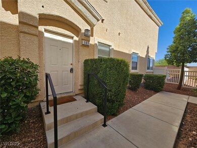 View of exterior entry with stucco siding