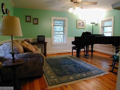 1st Bedroom. Pine Floors in left front bedroom presently being used as a music room.