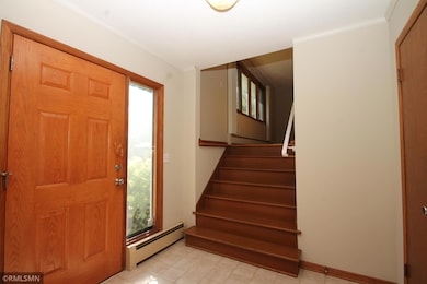 Entry area features a large closet and side light window.