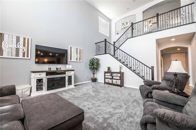 Formal entry to great room. 20' soaring ceilings h
