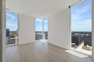 Unfurnished room featuring wood finished floors, 