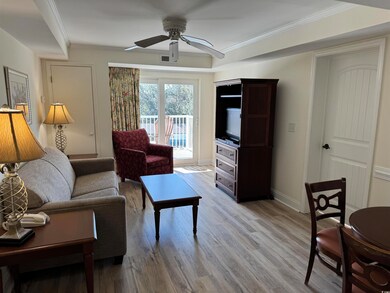 Living area with baseboards, a ceiling fan, light 