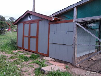 Storage She with electric. Riding mower included.