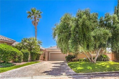 Obstructed view of property with a garage, drivewa