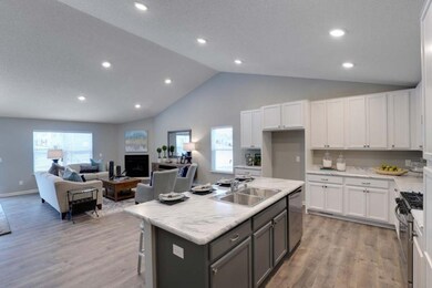 The open-concept floor plan allows for easy entert