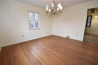The dining room can hold the largest of tables. Im