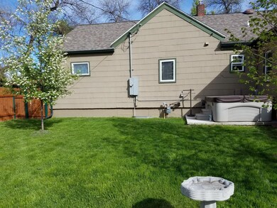 Hot tub and fenced back yard
