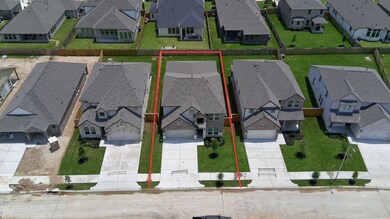 This home sits on a large lot with ample yard space in front and the back, lush landscaping and a well-maintained yard.