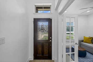 The foyer is a breath of fresh air—light, bright,