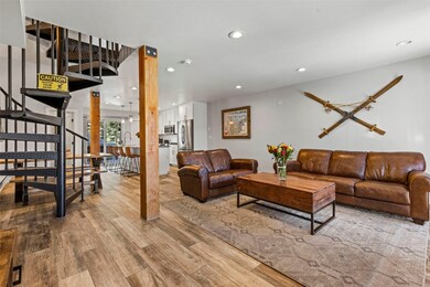 Living room with recessed lighting, wood finished