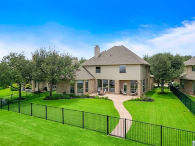 Large back patio and walkway leading you to a priv