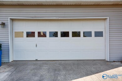 2-car side entry garage with separate door to outside patio.