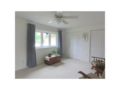 Living Room. A delightful bow window allows the su