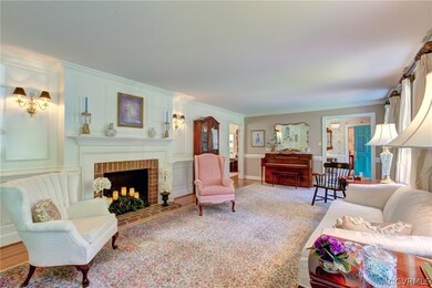 Large Living Room with Beautiful Sconces
