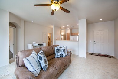 Entry way, living room and view of the k