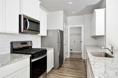 The heart of the home features all new Whirlpool® appliances!