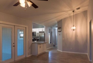 French doors leading to screened porch