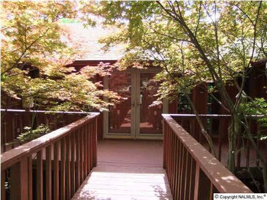 Walkway to the beautiful double-door entry.