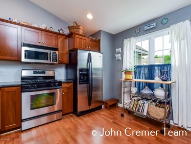 8346 Hawkshead SE unit 47, Byron Center, MI 49315 - photo 6