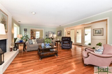 Living Room towards Dining Room and Sunroom to lef