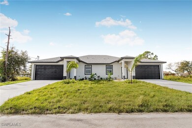 View of front of property featuring stucco siding,