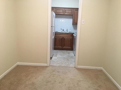 Looking into kitchen (through pocket doorway) from dining room