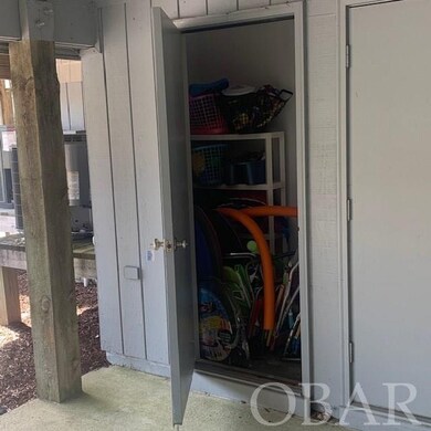 In carport next to laundry room (pic of laundry ro