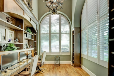 Classic Tuscan-style iron and crystal chandeliers