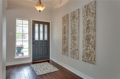 Entry way with hardwoods.