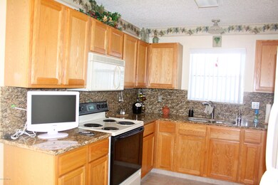 Kitchen w/Granite Counter tops