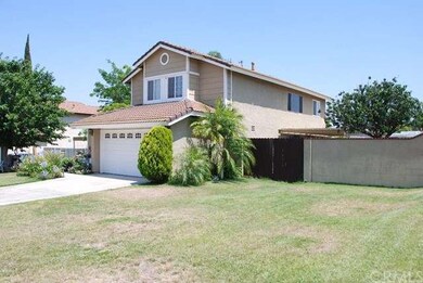 Large nicely landscaped front yard.
