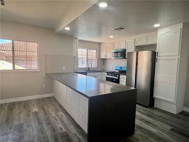 Kitchen featuring stainless steel appliances, a pe