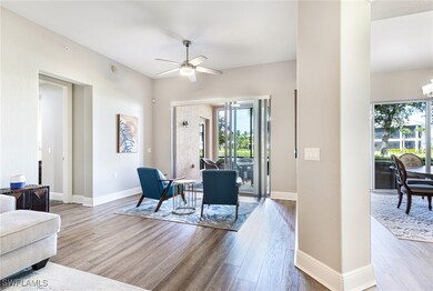Living room with hardwood / wood-style flooring, c