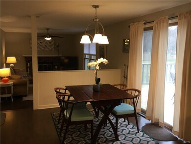 Plenty of room for your kitchen table and sliders out to the large deck.