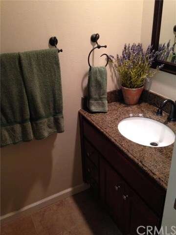 Remodeled guest bathroom - new tile, cherry cabine