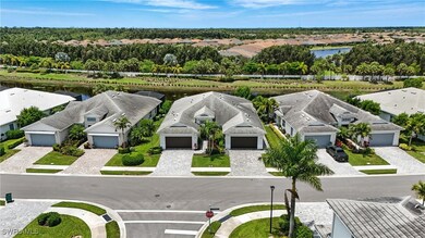 Aerial view of residential area with a large body