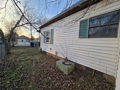 View of property exterior at dusk